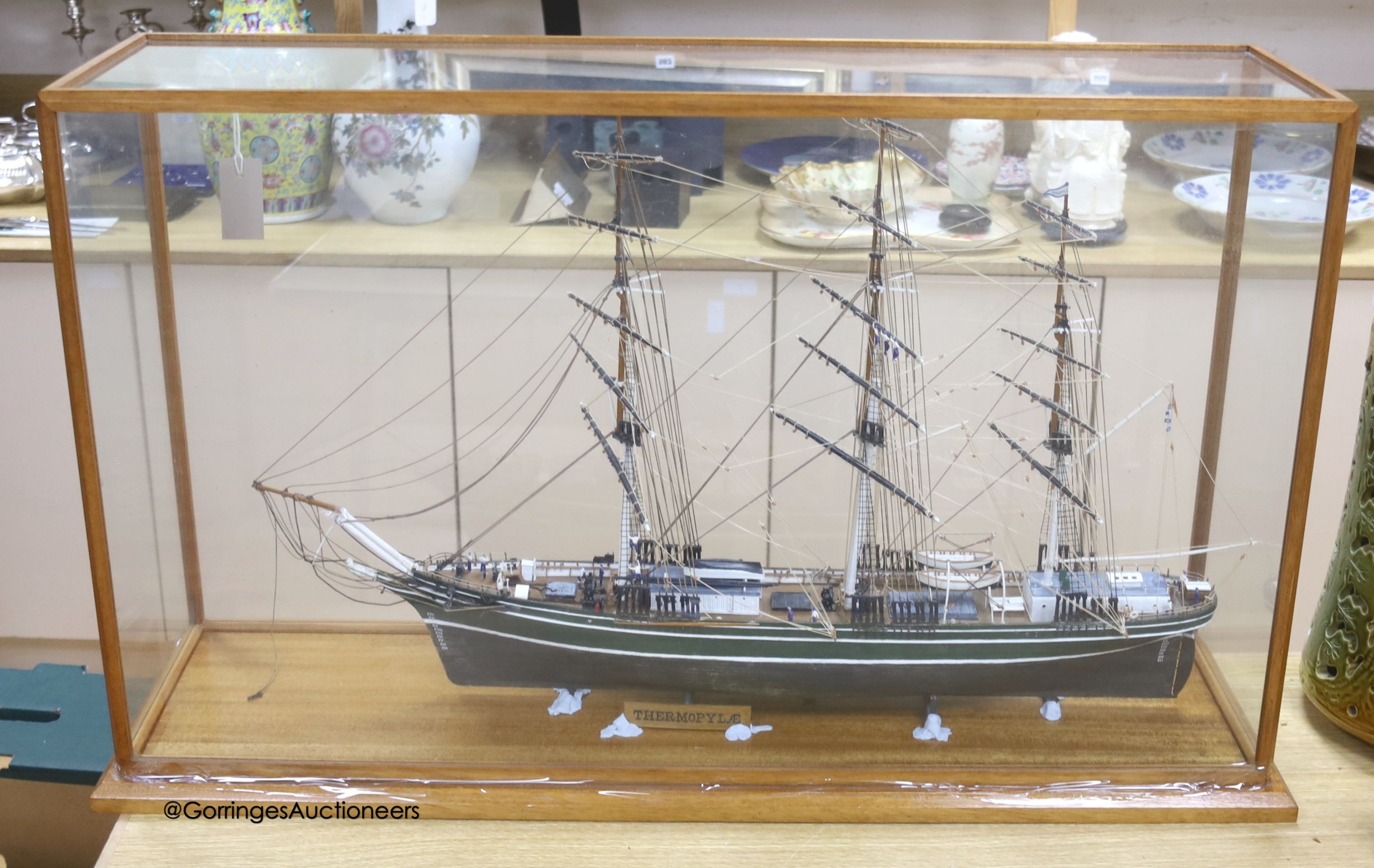 A model of a clipper ship in glazed case